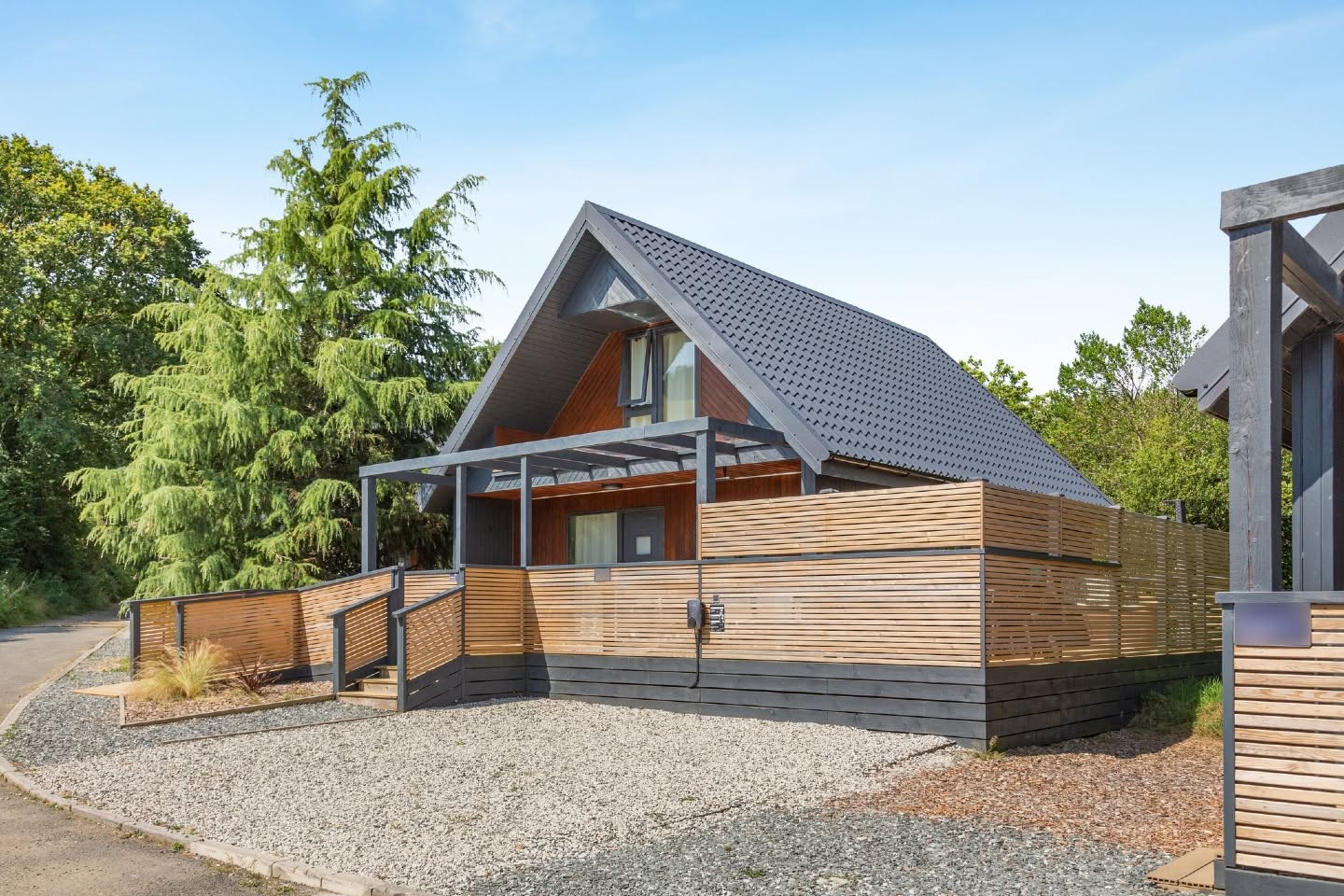 Large decking installation surrounding a lodge